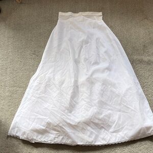 Vintage white A-line bridal crinoline petticoat with a lace-trimmed hem